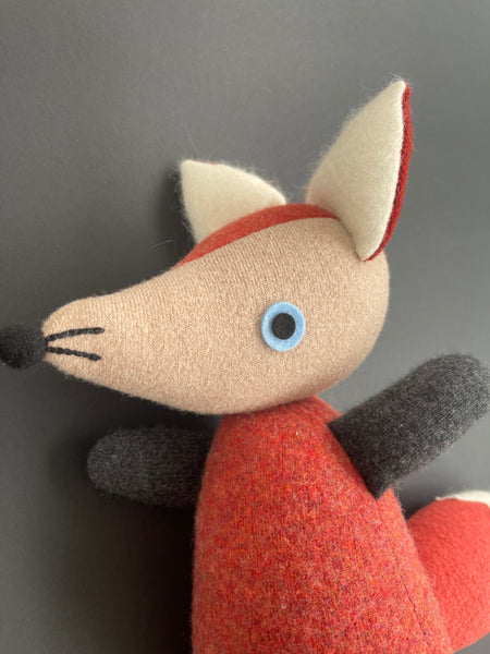 Fox - orange with blue eyes